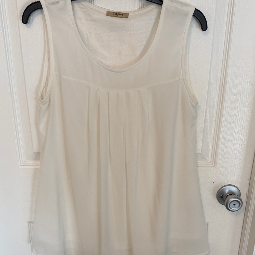 Chic Ivory Sleeveless Blouse